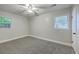 Bright bedroom with neutral paint, ceiling fan, carpeted floor, and natural light at 141 Larson Dr, Summerville, SC 29485