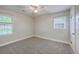 Bright bedroom with neutral paint, ceiling fan, carpeted floor, and natural light at 141 Larson Dr, Summerville, SC 29485