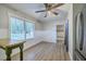 Bright kitchen eating area featuring new flooring, wainscotting, and a large window providing natural light at 141 Larson Dr, Summerville, SC 29485
