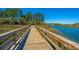 Scenic community boardwalk overlooking marsh and waterfront with lush greenery surrounding the area at 1543 Wando Landing St, Charleston, SC 29492
