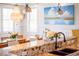 Kitchen featuring granite countertops, a double sink, and view of the dining area at 1543 Wando Landing St, Charleston, SC 29492