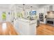 Kitchen featuring a granite island, stainless appliances, and white cabinetry at 1543 Wando Landing St, Charleston, SC 29492