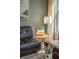 Close up of a living room featuring black leather sofas, and decor at 1543 Wando Landing St, Charleston, SC 29492