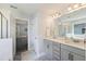 Bright bathroom with a double vanity and a large mirror at 164 Wappoo Trace Ln, Summerville, SC 29486