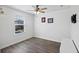 Bedroom with laminate flooring, ceiling fan, and window at 164 Wappoo Trace Ln, Summerville, SC 29486