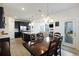 View of the dining and kitchen area that feature the open floor plan at 164 Wappoo Trace Ln, Summerville, SC 29486
