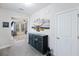View of the entryway with gray floors, blue cabinet and an open floor plan at 164 Wappoo Trace Ln, Summerville, SC 29486