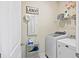 Laundry room featuring washer and dryer, shelving and storage area at 164 Wappoo Trace Ln, Summerville, SC 29486