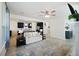 Bright and open living room featuring lots of natural light, a fireplace, and a comfortable seating area at 164 Wappoo Trace Ln, Summerville, SC 29486