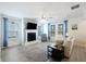 Bright and open living room featuring lots of natural light, a fireplace, and a comfortable seating area at 164 Wappoo Trace Ln, Summerville, SC 29486