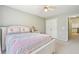 Cozy bedroom with neutral carpet, featuring a ceiling fan, and closet at 174 Revetment Ln, Mount Pleasant, SC 29464