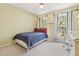 Comfortable bedroom with a queen bed and natural light from two windows at 174 Revetment Ln, Mount Pleasant, SC 29464