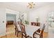 Traditional dining room with hardwood floors, classic furnishings, and easy access to other living areas at 174 Revetment Ln, Mount Pleasant, SC 29464