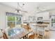 Bright eat-in kitchen with granite countertops, an island with seating, and stainless steel appliances at 174 Revetment Ln, Mount Pleasant, SC 29464