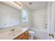 Bright bathroom featuring a bathtub/shower combo and single sink vanity at 206 Barnwell St, Summerville, SC 29483