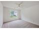 Neutral bedroom with carpet, ceiling fan, and natural light from a window at 206 Barnwell St, Summerville, SC 29483