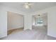 Open concept living room with adjacent rooms, featuring a sliding glass door for natural light at 206 Barnwell St, Summerville, SC 29483