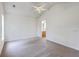 Carpeted main bedroom with natural light and a view into the ensuite bathroom at 206 Barnwell St, Summerville, SC 29483