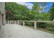 Back deck features wood planks, railing, and backyard area, enclosed with a fence at 2177 Gulf Dr, Mount Pleasant, SC 29464