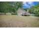 Spacious backyard features a deck, a shed, lawn and partial view of the back of the home at 2177 Gulf Dr, Mount Pleasant, SC 29464