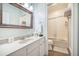 Traditional bathroom featuring a vanity with a large mirror, toilet, and shower/bath combination at 2177 Gulf Dr, Mount Pleasant, SC 29464