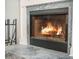 Close-up of fireplace showcasing the slate surround and hearth at 2177 Gulf Dr, Mount Pleasant, SC 29464