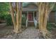 Inviting front entrance, showing a brick pathway and symmetrical landscaping at 2177 Gulf Dr, Mount Pleasant, SC 29464