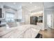 Bright kitchen with marble countertops, stainless appliances, and white cabinets and trim at 2177 Gulf Dr, Mount Pleasant, SC 29464