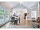 Living space with dining table and white kitchen visible in the background at 2177 Gulf Dr, Mount Pleasant, SC 29464