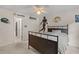 A well-lit bedroom decorated with sports-themed items, with an open door to another room at 2221 Black Oak Ct, Mount Pleasant, SC 29466