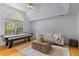 Spacious game room features an air hockey table, comfortable seating, and a large window at 2221 Black Oak Ct, Mount Pleasant, SC 29466