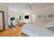 Spacious main bedroom with ceiling fan and sitting area filled with light from multiple windows at 2221 Black Oak Ct, Mount Pleasant, SC 29466