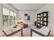 Bright sitting room with reading nook with views to the exterior through the large windows at 2221 Black Oak Ct, Mount Pleasant, SC 29466