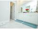 Bright bathroom featuring dual sinks, quartz counters and tile floors at 232 Ashworth Dr, Summerville, SC 29486