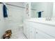 Bright bathroom with a tub, toilet, vanity, white marble floors, and gray walls at 232 Ashworth Dr, Summerville, SC 29486