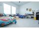 Shared bedroom featuring decor, large windows, shelving and two twin sized beds at 232 Ashworth Dr, Summerville, SC 29486