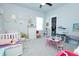 Bright bedroom features a ceiling fan, a window and a closet for organization at 232 Ashworth Dr, Summerville, SC 29486