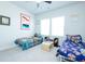 Shared bedroom featuring decor, large windows and two twin sized beds at 232 Ashworth Dr, Summerville, SC 29486
