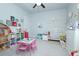 Bright bedroom features a ceiling fan, decor, and an array of play options at 232 Ashworth Dr, Summerville, SC 29486