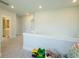 Hallway looking into loft featuring carpeted floors and neutral paint at 232 Ashworth Dr, Summerville, SC 29486