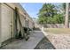 Backyard patio area with room for entertaining, grill, and a garden at 242 Amy Dr, Goose Creek, SC 29445
