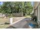 Covered patio and large backyard with a firepit, great for entertaining at 242 Amy Dr, Goose Creek, SC 29445