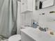 Simple bathroom with a vanity, toilet, and shower offering essential amenities for daily use at 242 Amy Dr, Goose Creek, SC 29445