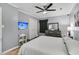 Cozy bedroom with ceiling fan, dresser, and TV, designed for comfort and relaxation at 242 Amy Dr, Goose Creek, SC 29445