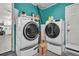 Functional laundry room with modern washer and dryer set, and ample space for storage at 242 Amy Dr, Goose Creek, SC 29445