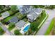 An aerial view of the property with a pool, manicured lawn, and tasteful landscaping at 2792 River Vista Way, Mount Pleasant, SC 29466