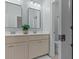 A clean bathroom showcasing double sinks, a light color palette, and a toilet room at 2792 River Vista Way, Mount Pleasant, SC 29466