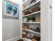 Hallway with built-in shelves and stylish decor at 2792 River Vista Way, Mount Pleasant, SC 29466