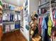 Spacious walk-in closet with ample storage solutions for clothes, shoes, and accessories, promoting organized living at 2792 River Vista Way, Mount Pleasant, SC 29466