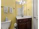 Bathroom featuring a dark wood vanity, a white toilet and mirror at 2881 Rutherford Way, Charleston, SC 29414